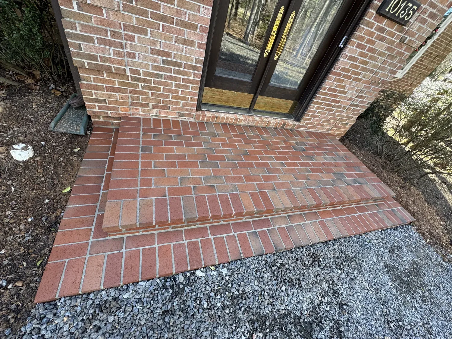 Brick patio and outdoor hardscaping project by Building America Construction