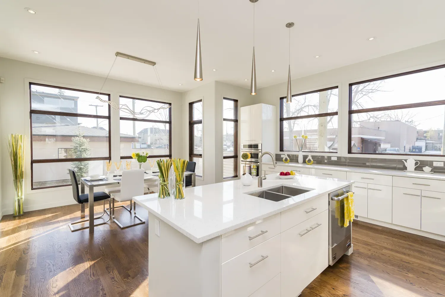 Kitchen remodel with center island and quartz countertops by Building America Construction